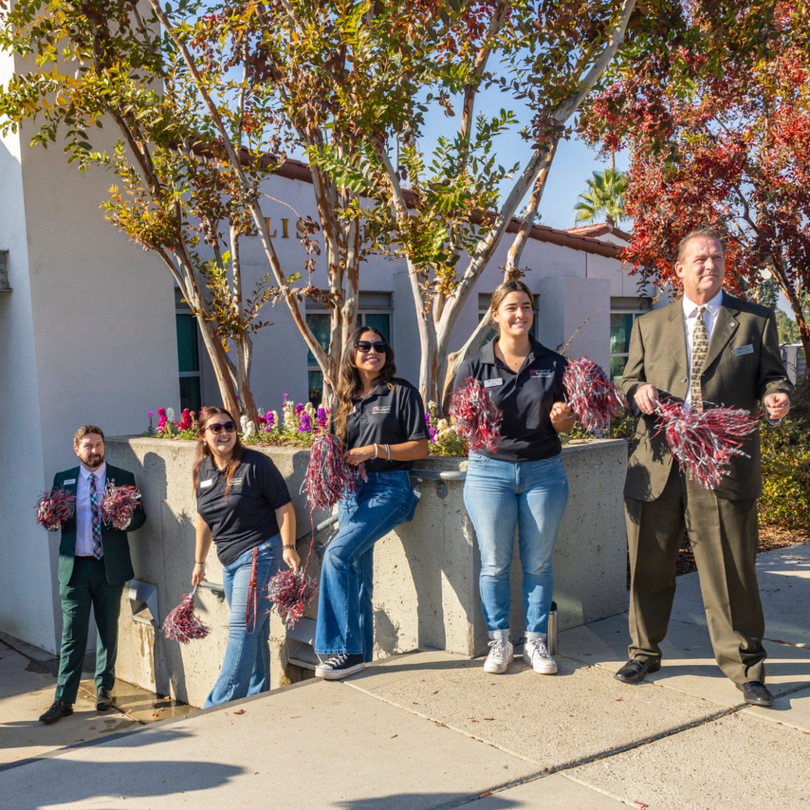 a group of people posing for a picture