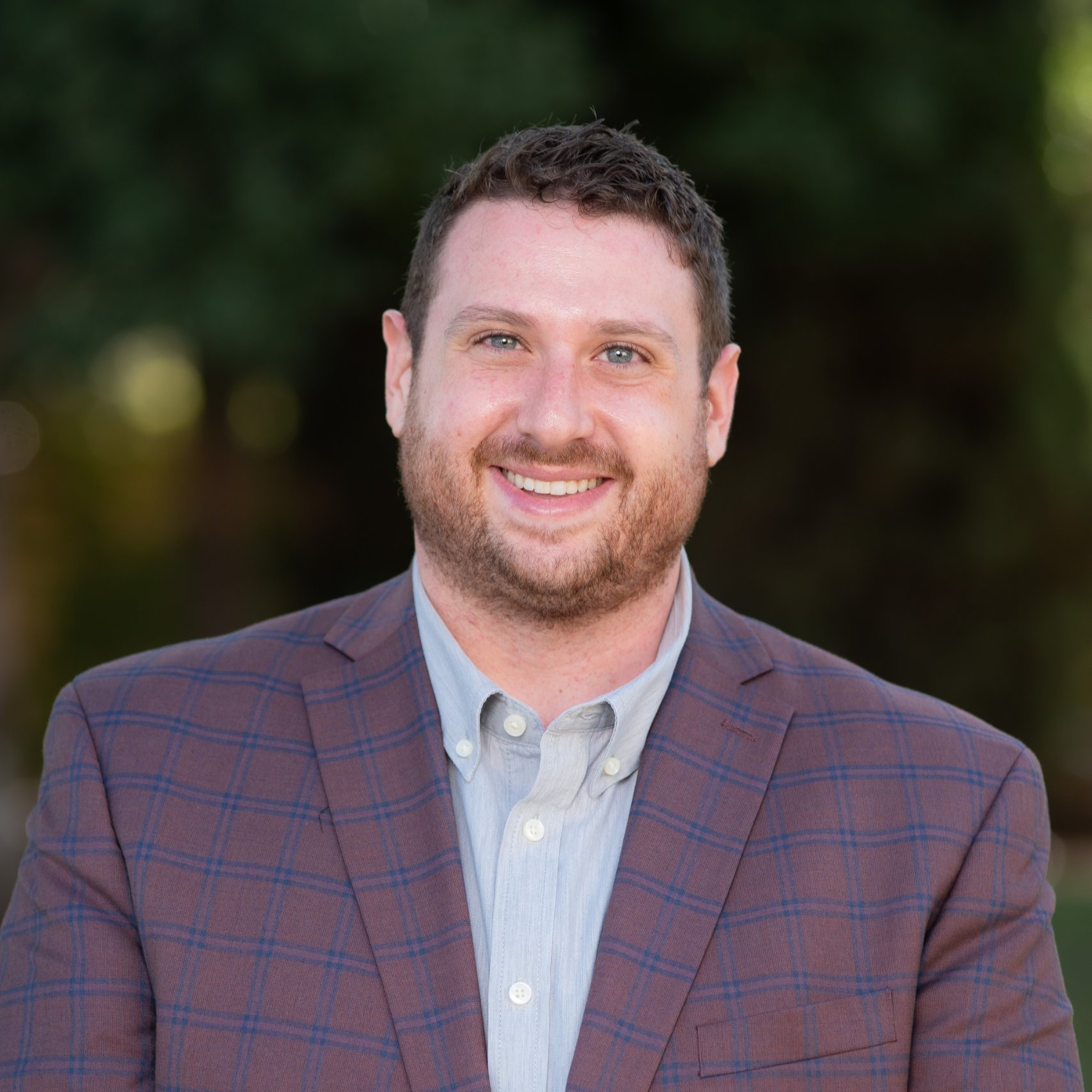 a person smiling for a picture