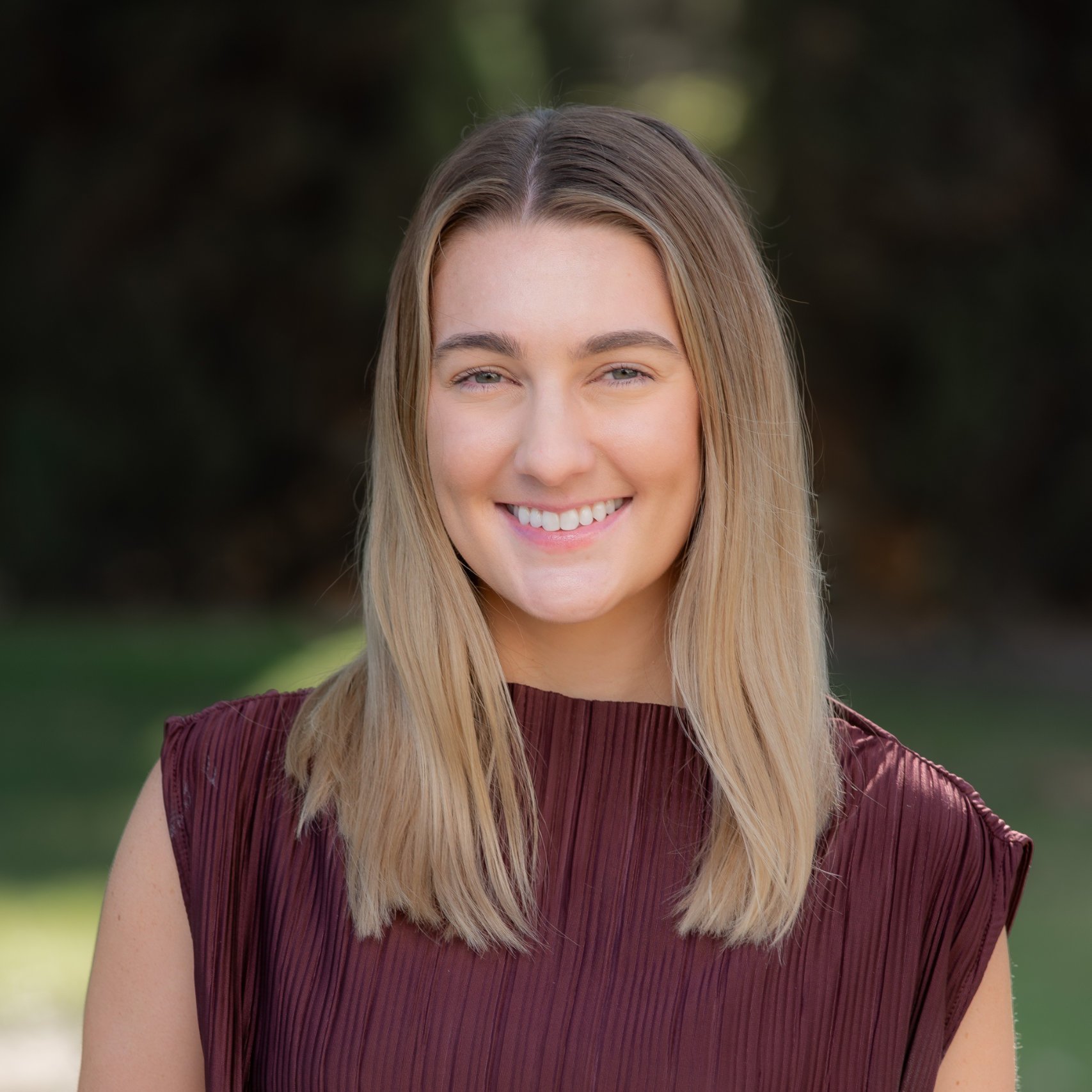 a person smiling at camera