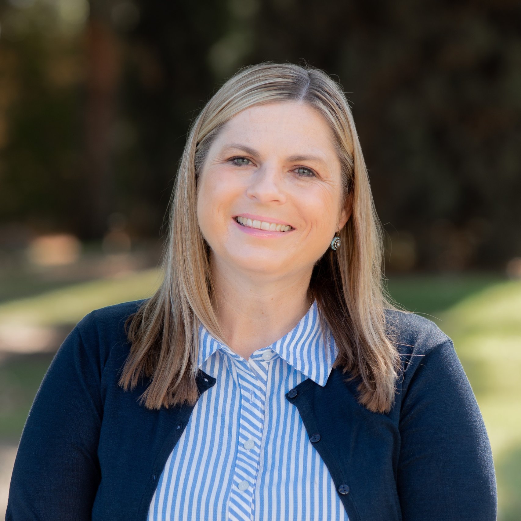 a person smiling at camera