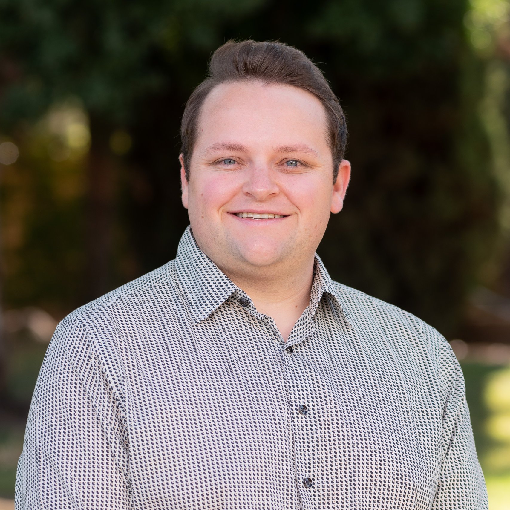 a person smiling for a picture