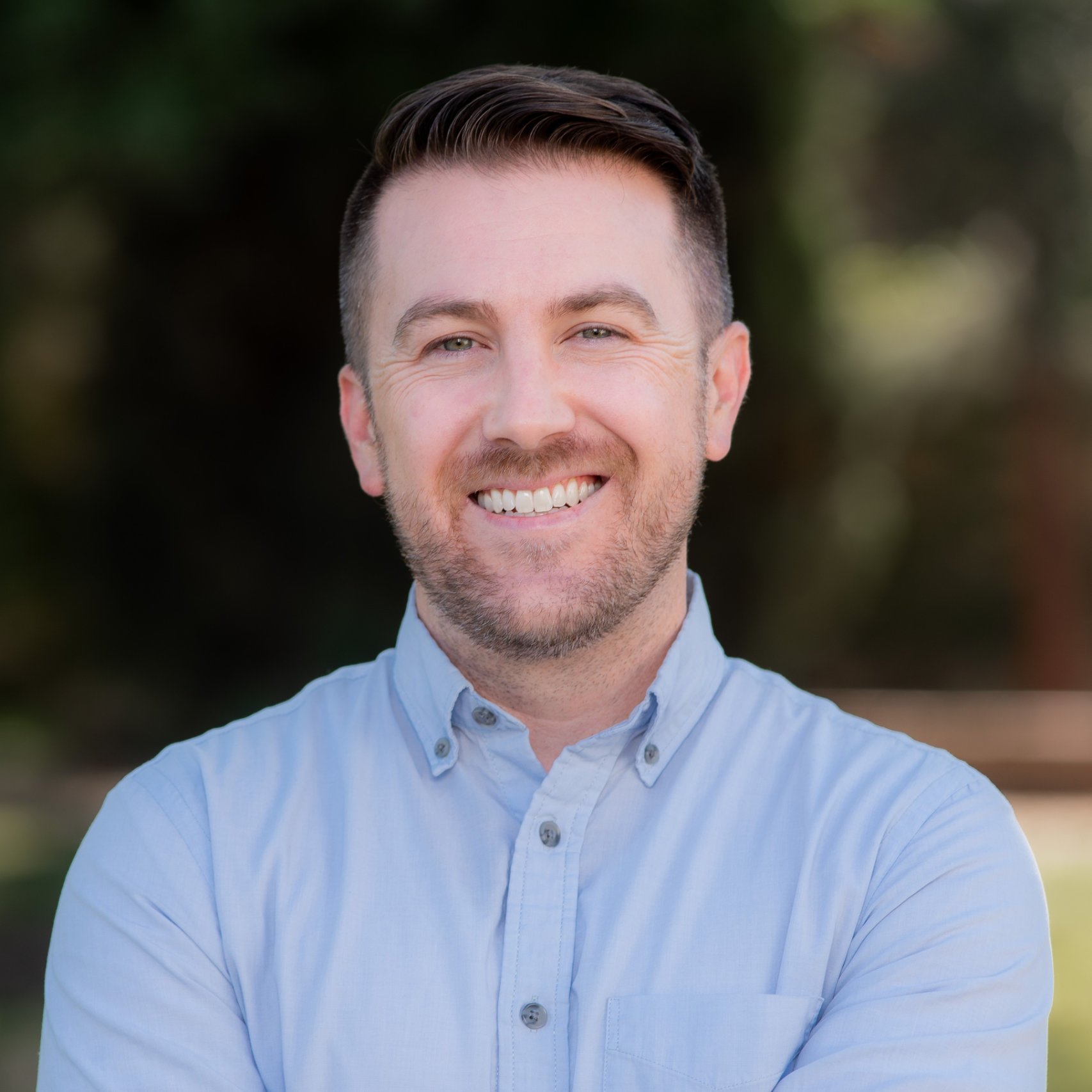 a person smiling at camera