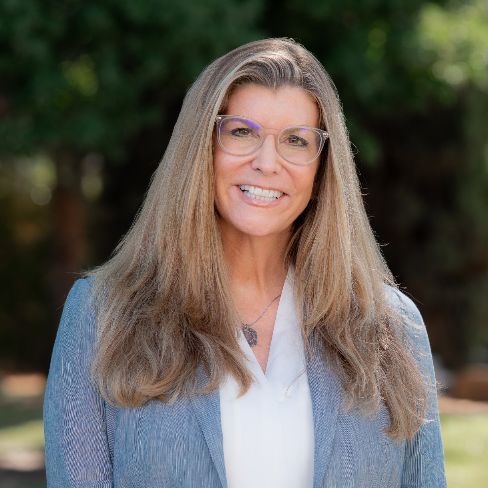 a person smiling at camera