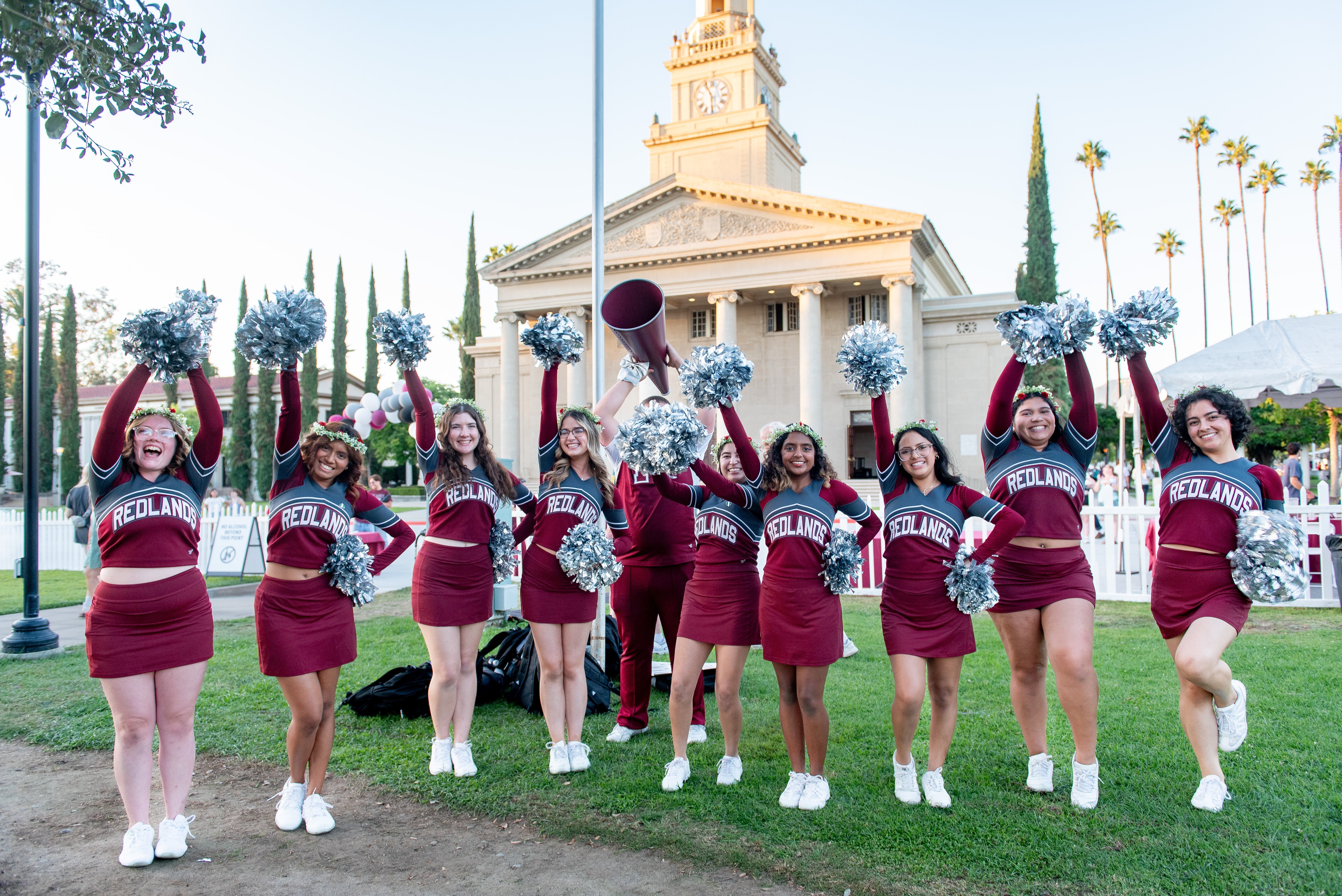 a group of cheerleaders posing for a photo