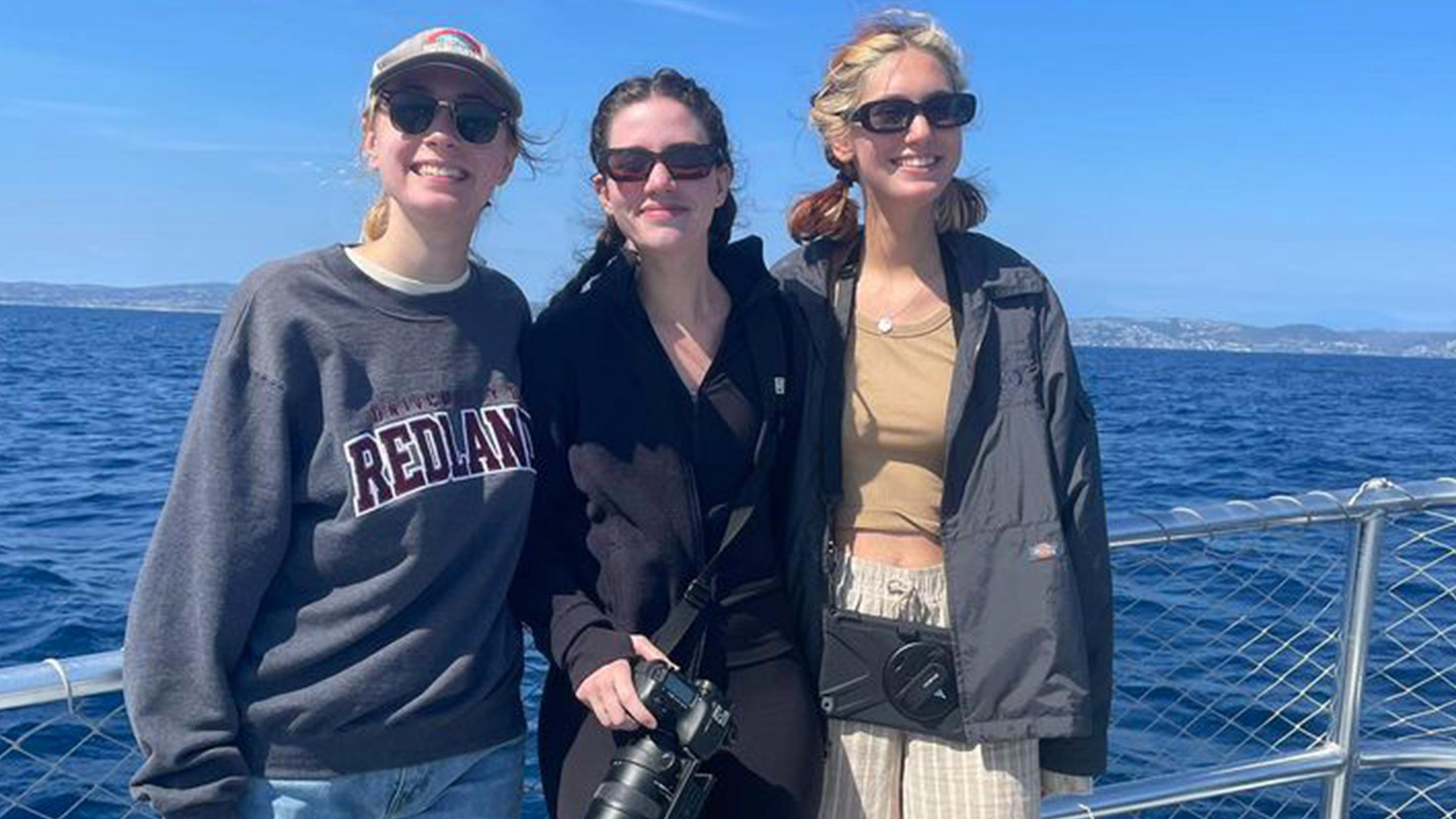 a group of women posing for a picture