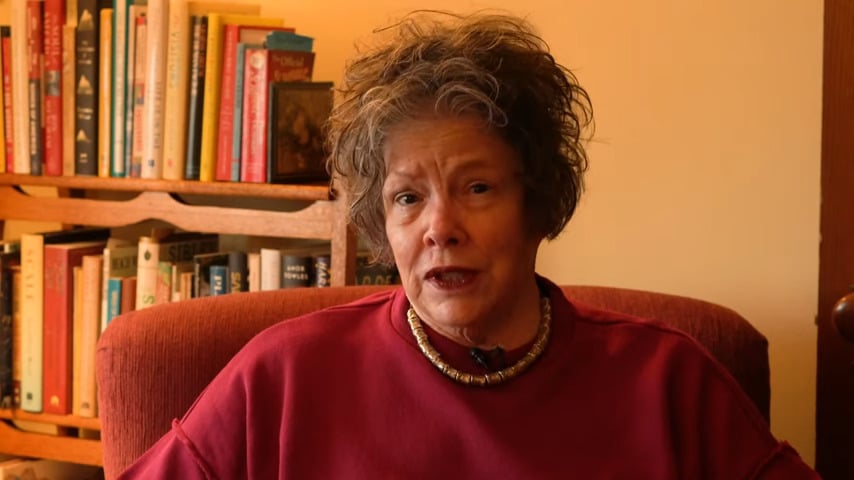 a woman sitting in a chair