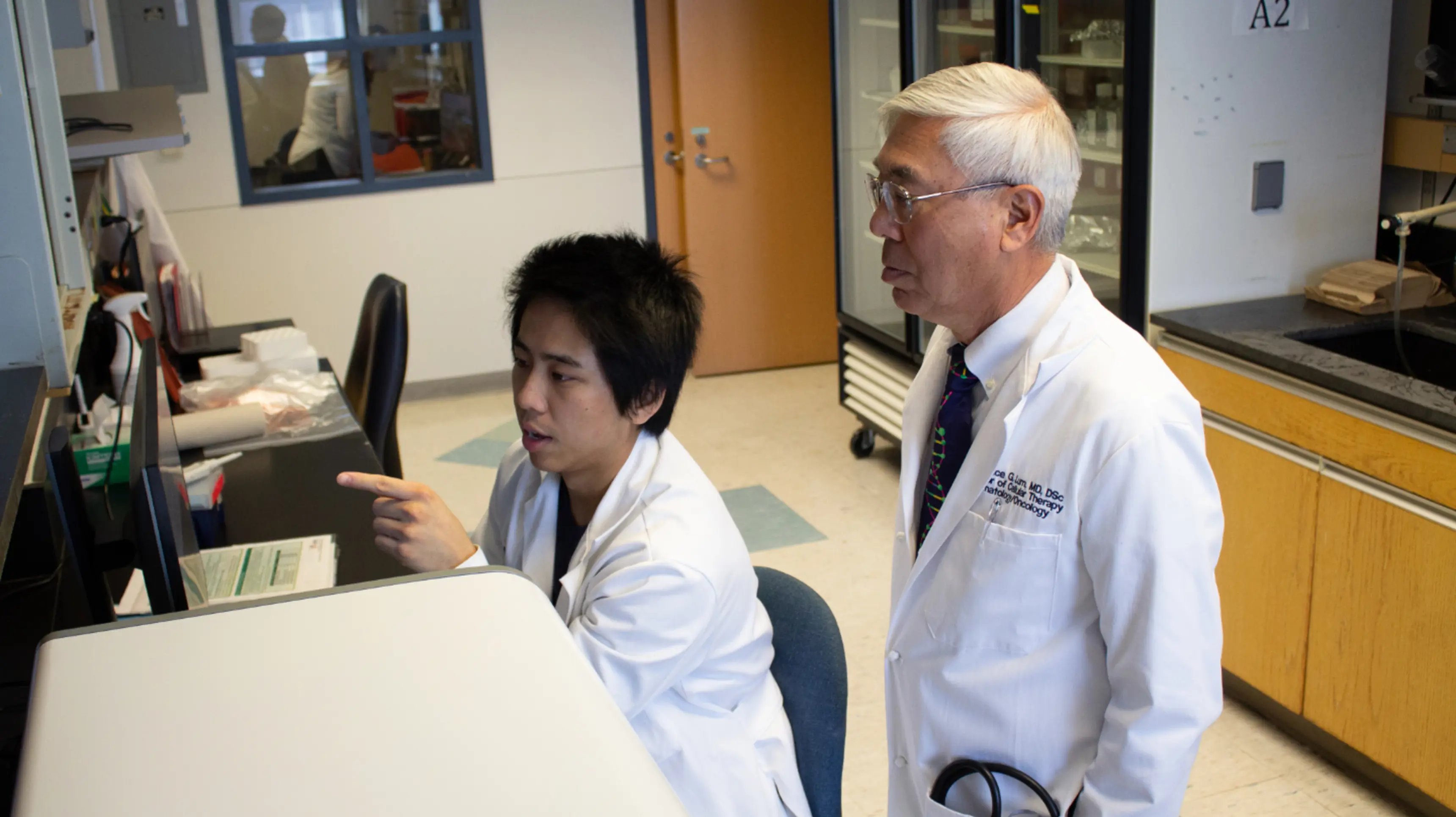 a man and woman in lab coats