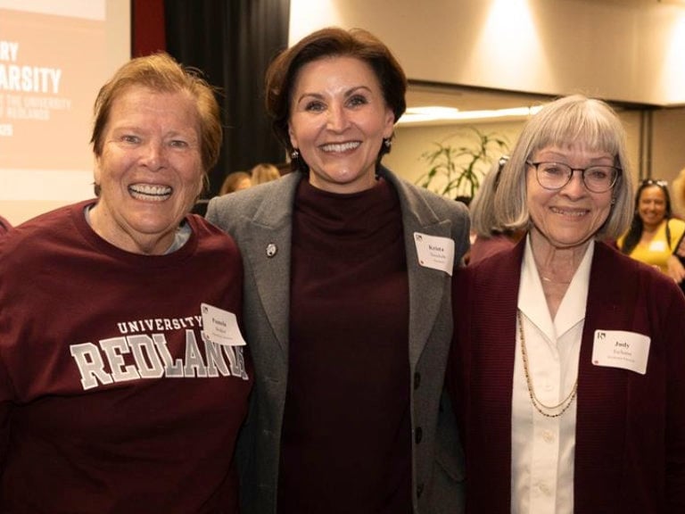 a group of women smiling