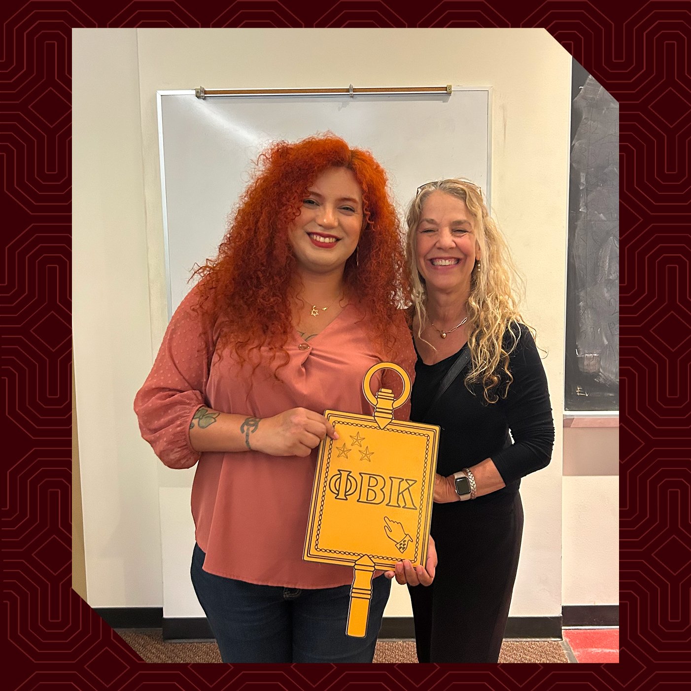 a group of women holding a sign