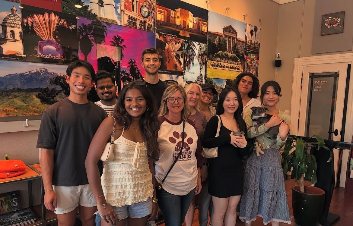 a group of people posing for a photo