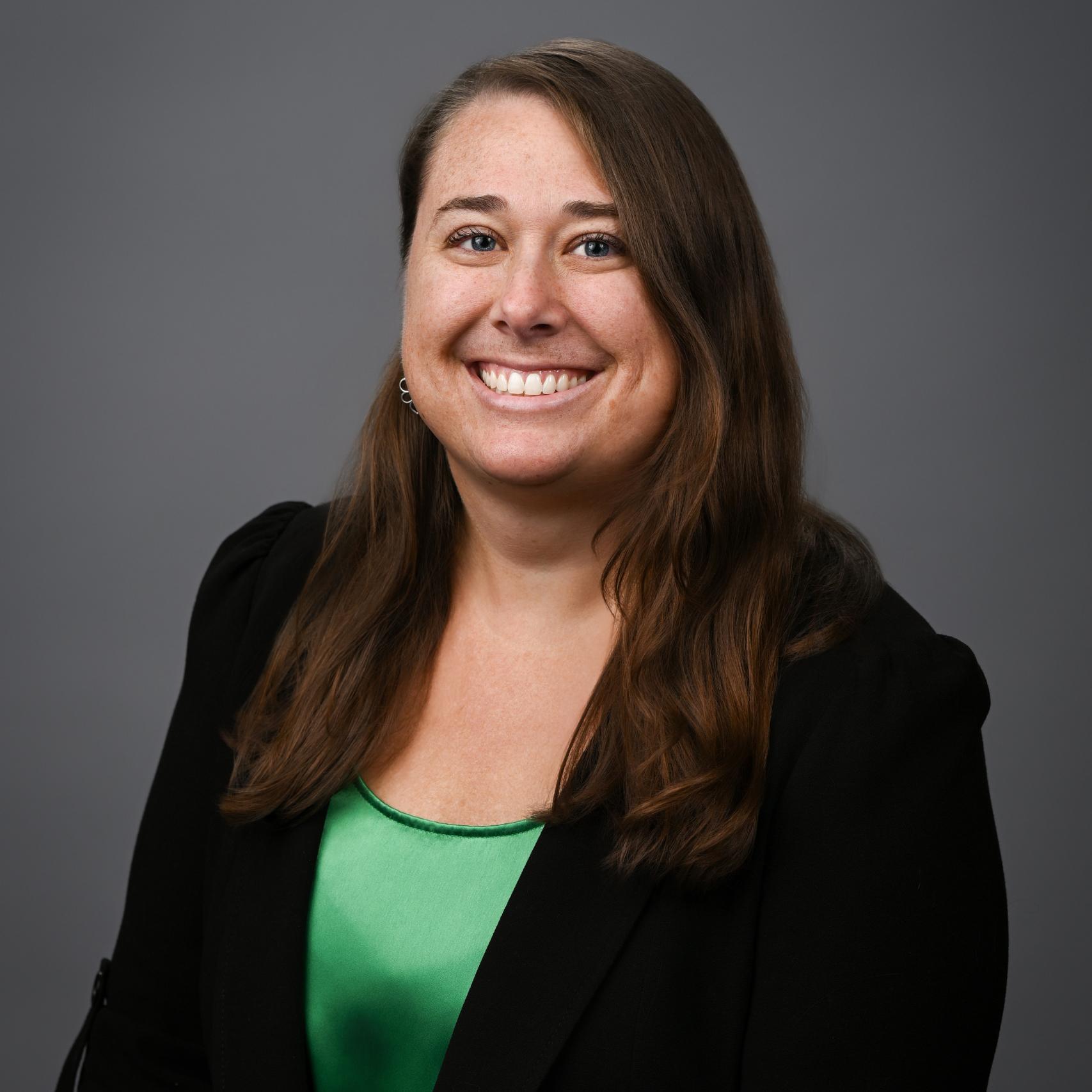 a woman smiling for a picture