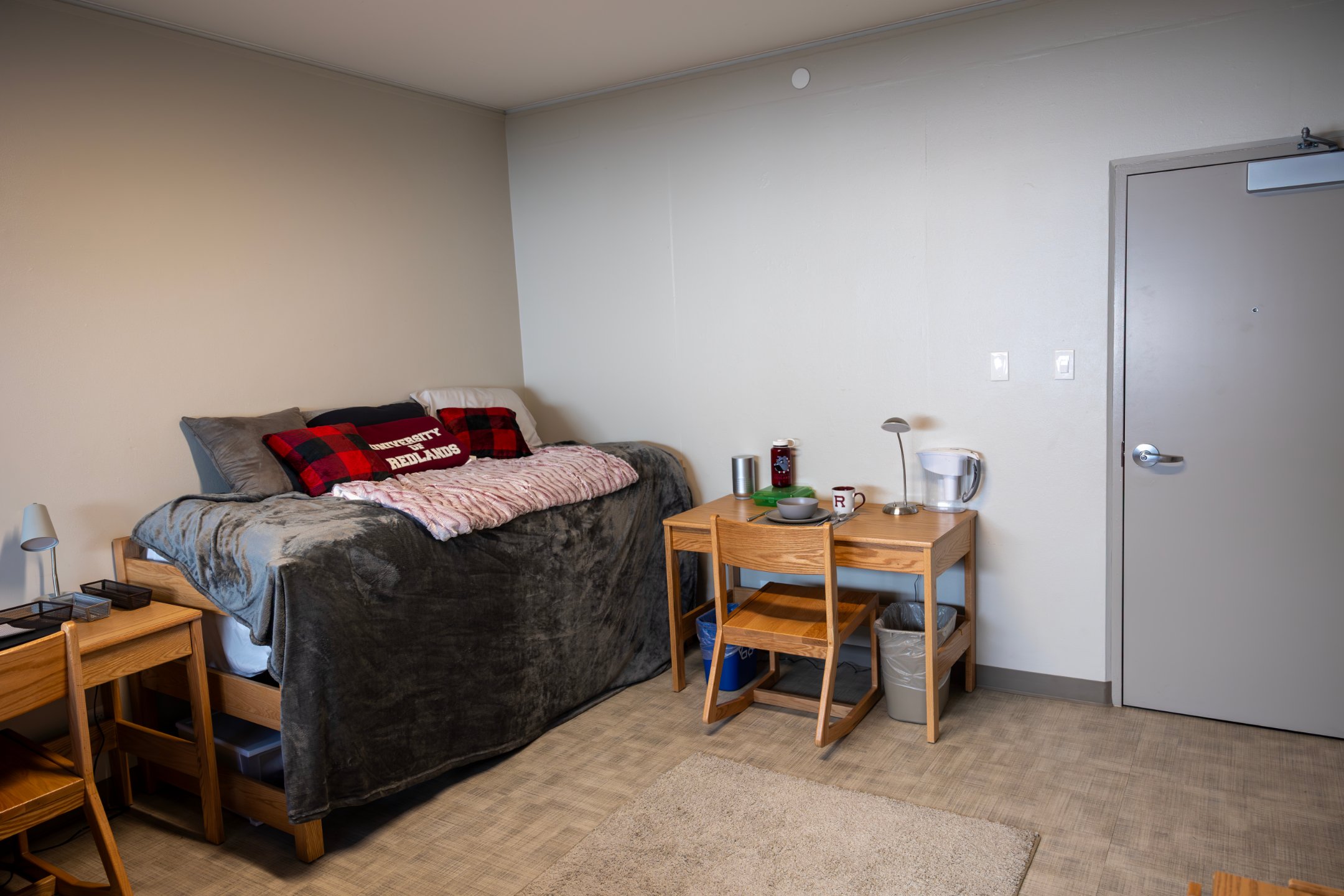 a bed and table in a room