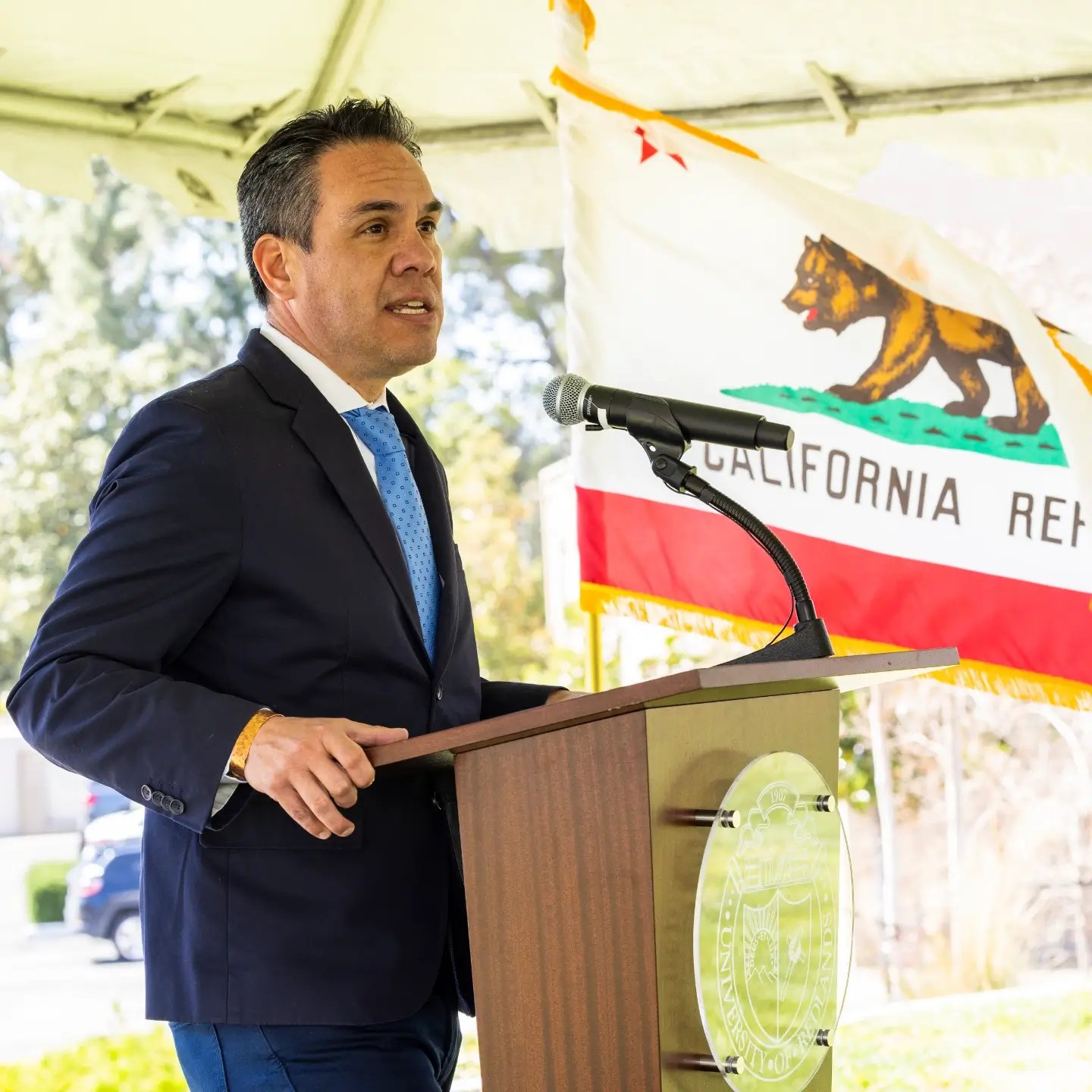 a man standing at a podium