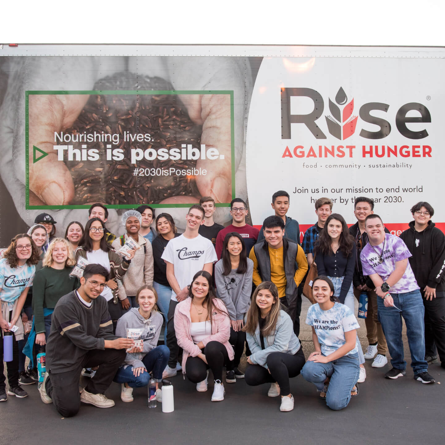 a group of people posing for a photo