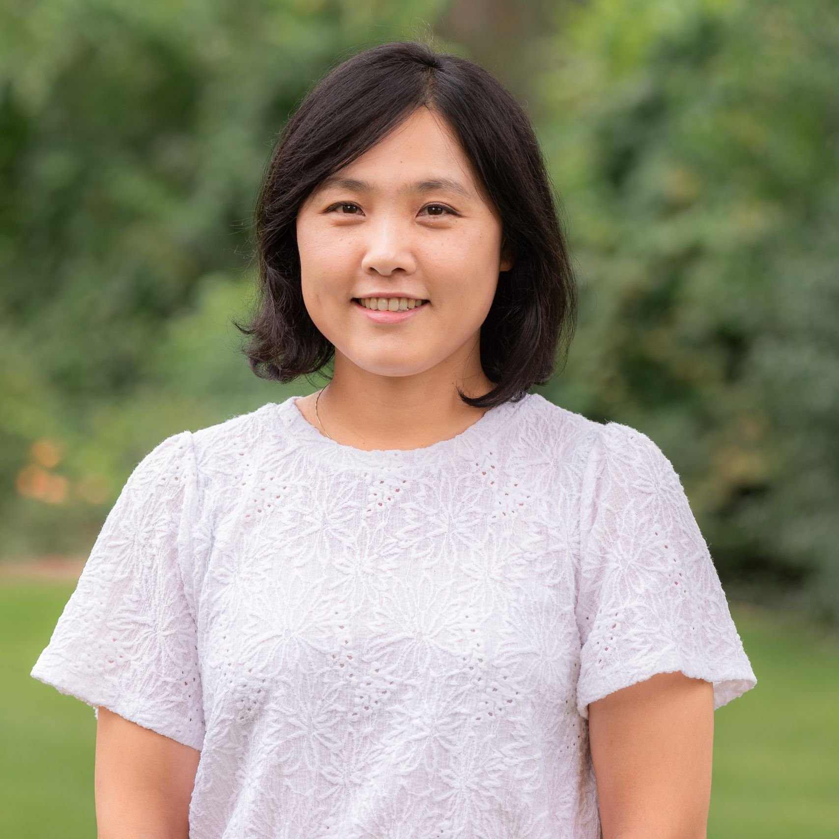 a woman smiling at camera