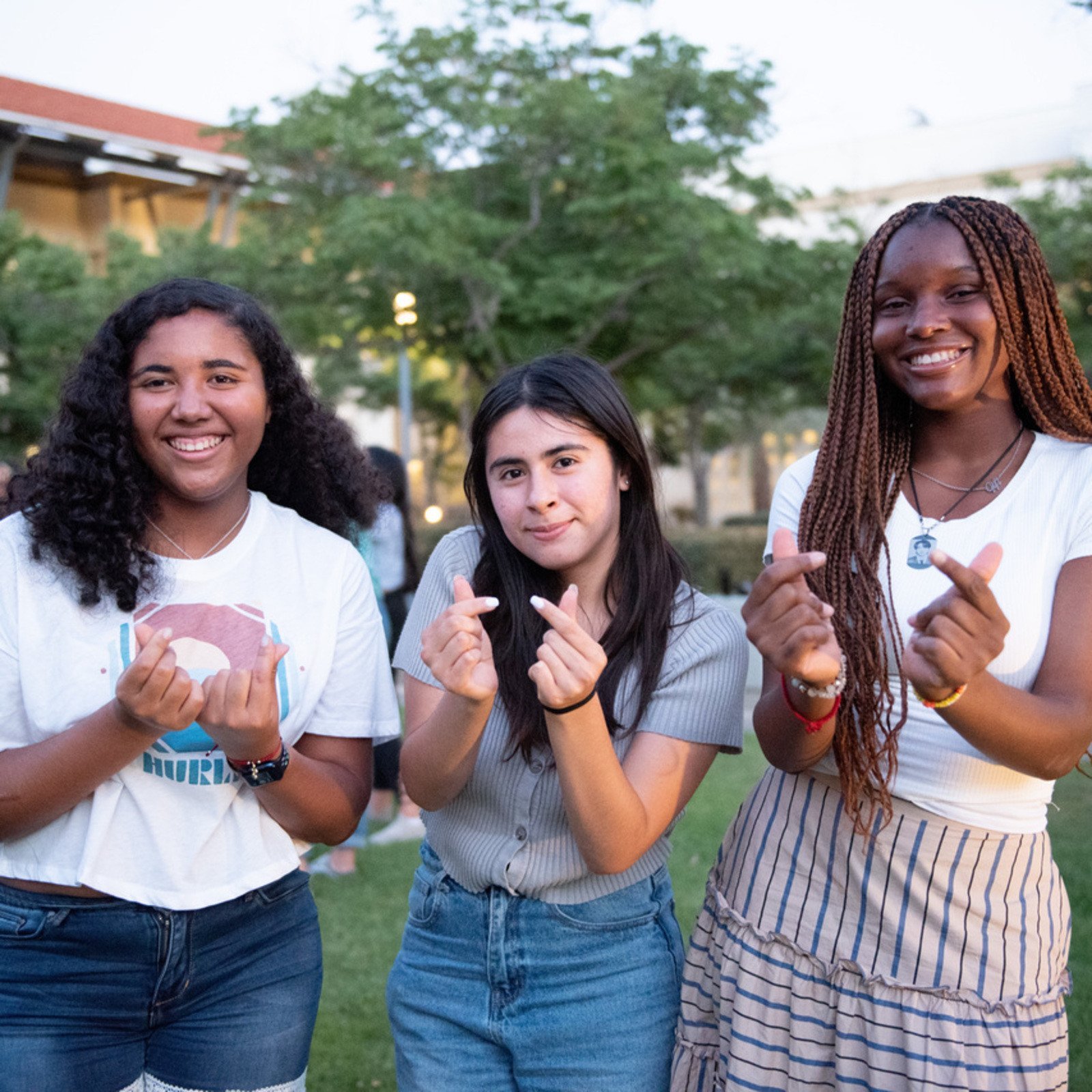 a group of childs standing in a field