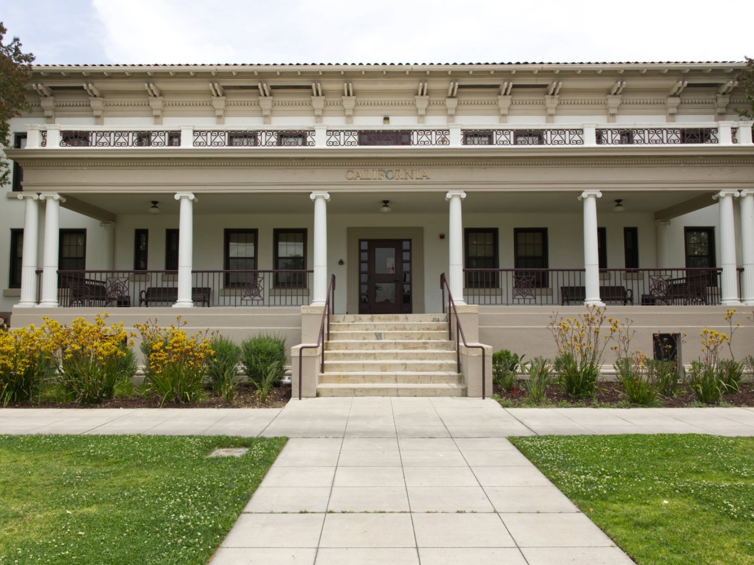 a building with columns and a walkway