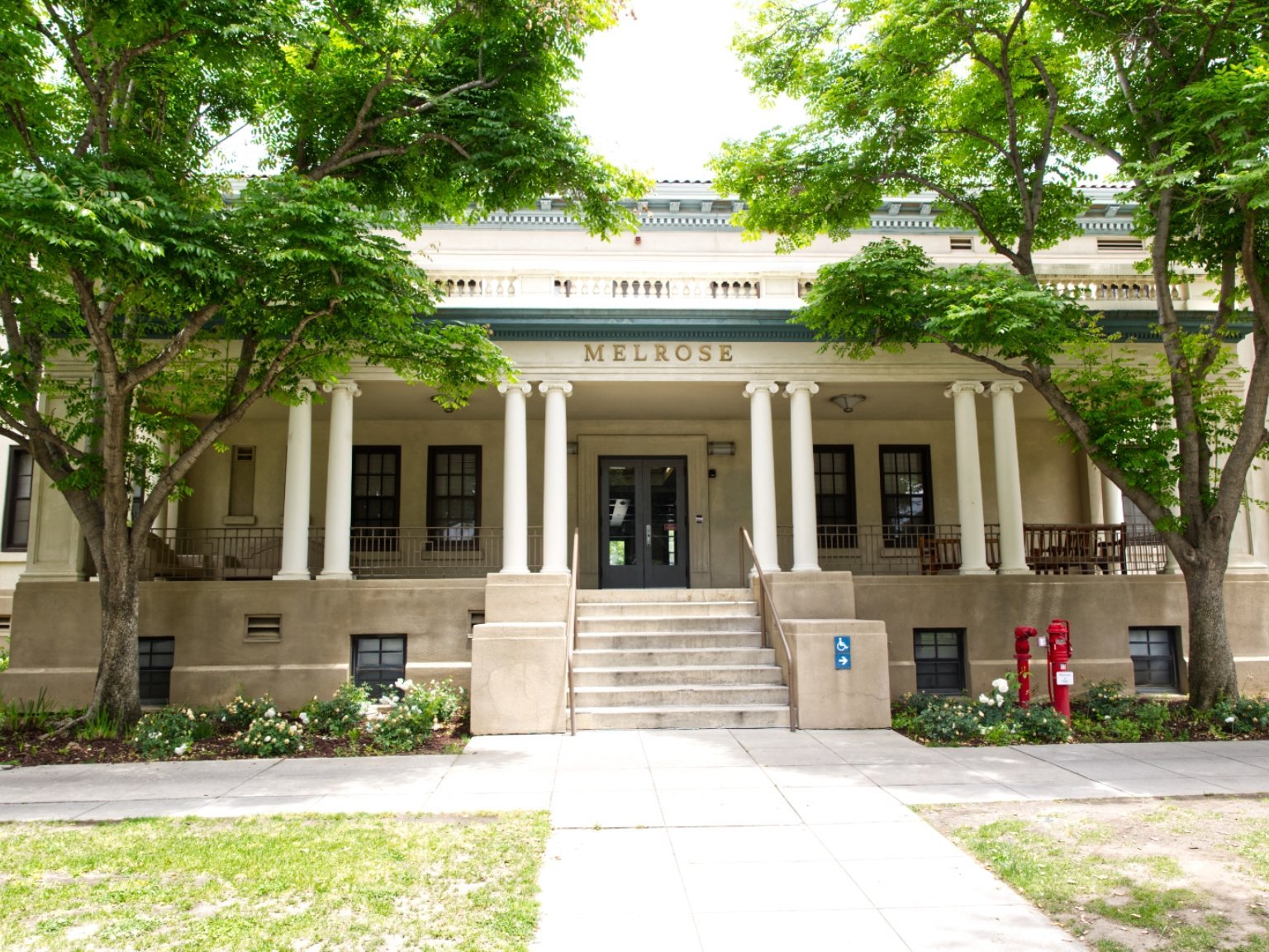 a building with columns and a walkway