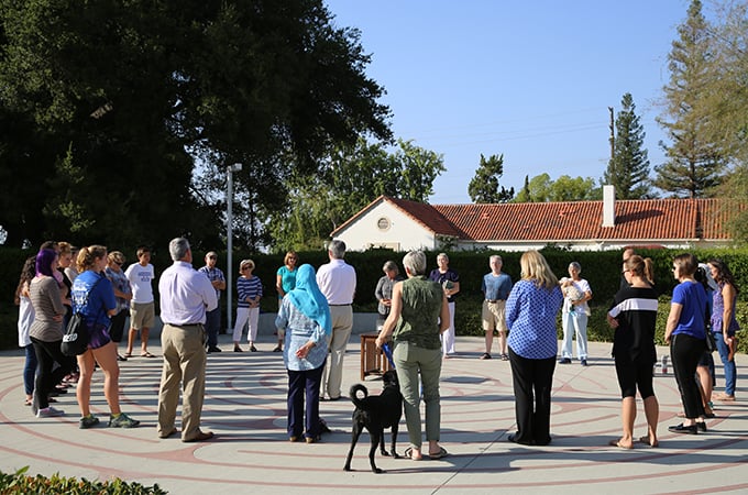 Students, staff, and faculty gather at the Labyrinth for Prayers for Peace. 