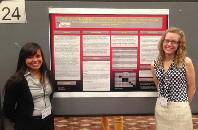 Students with their research poster