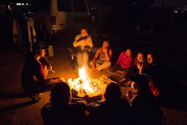 Students around a campfire