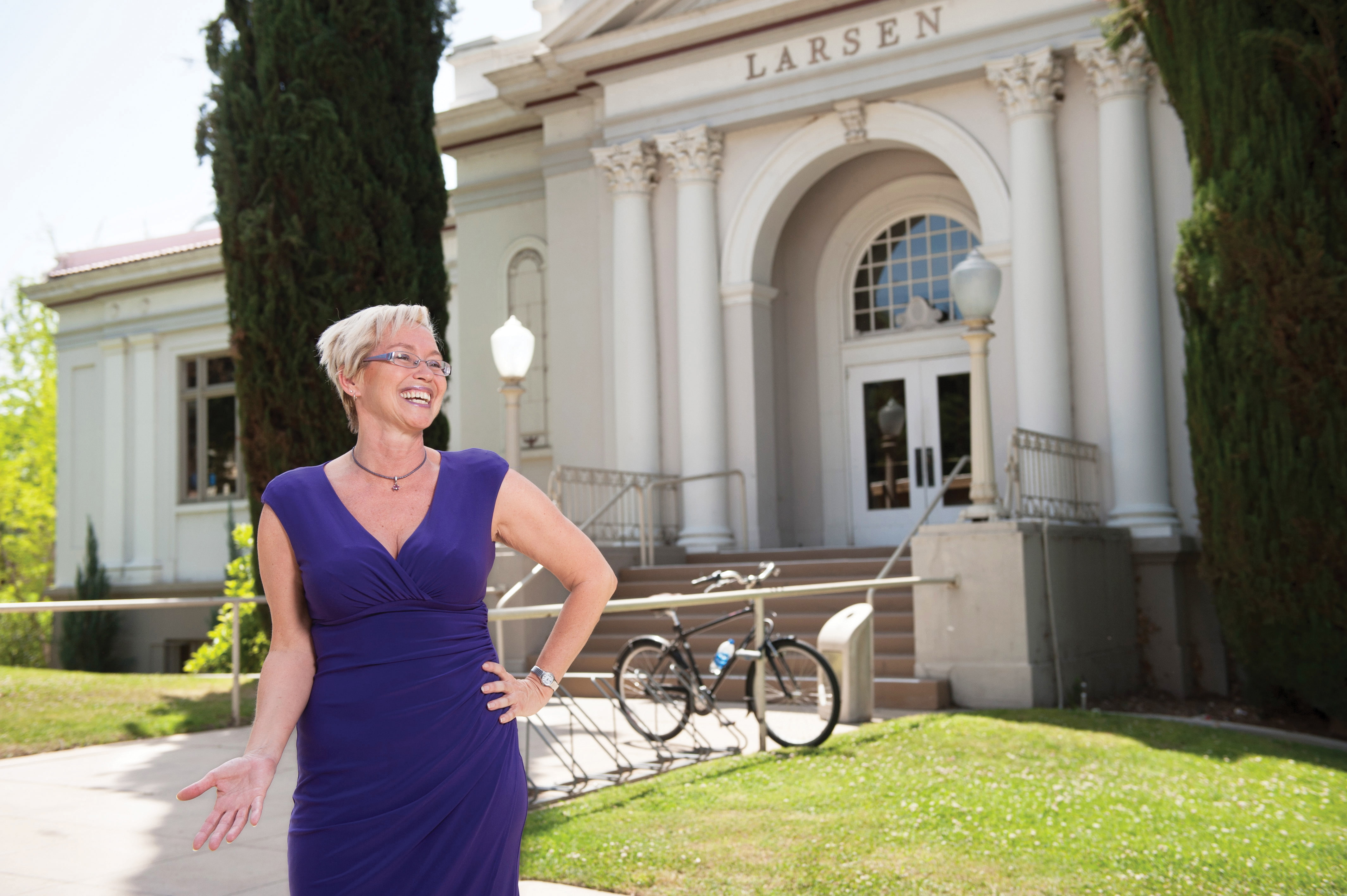 a woman in a purple dress
