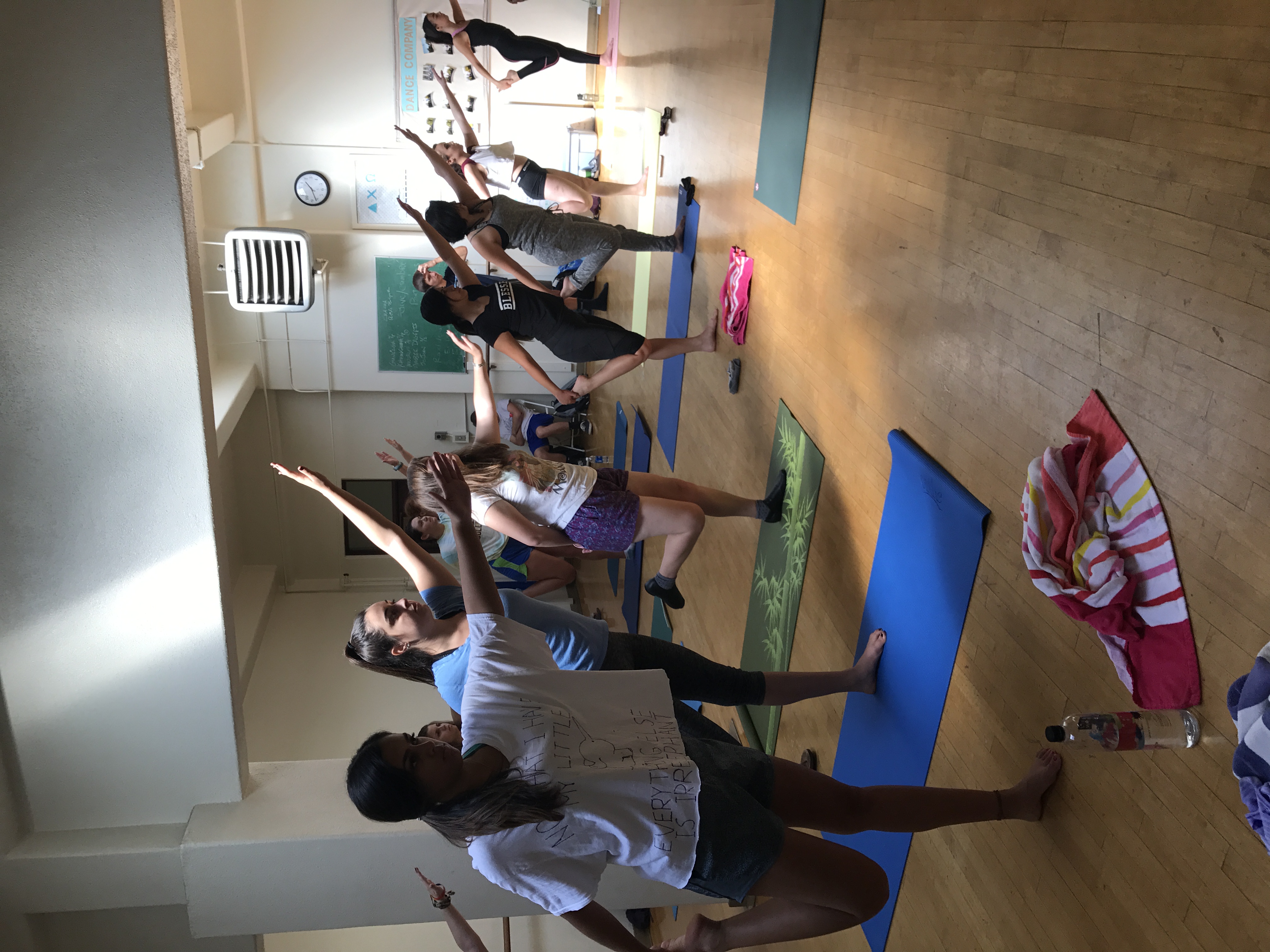 a group of people doing yoga