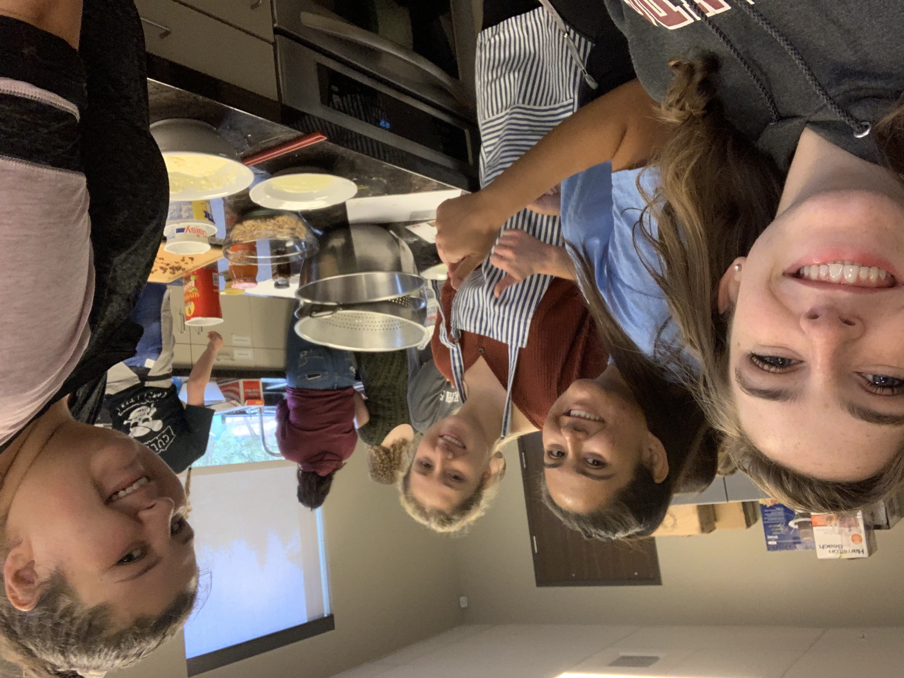 a group of women in a kitchen