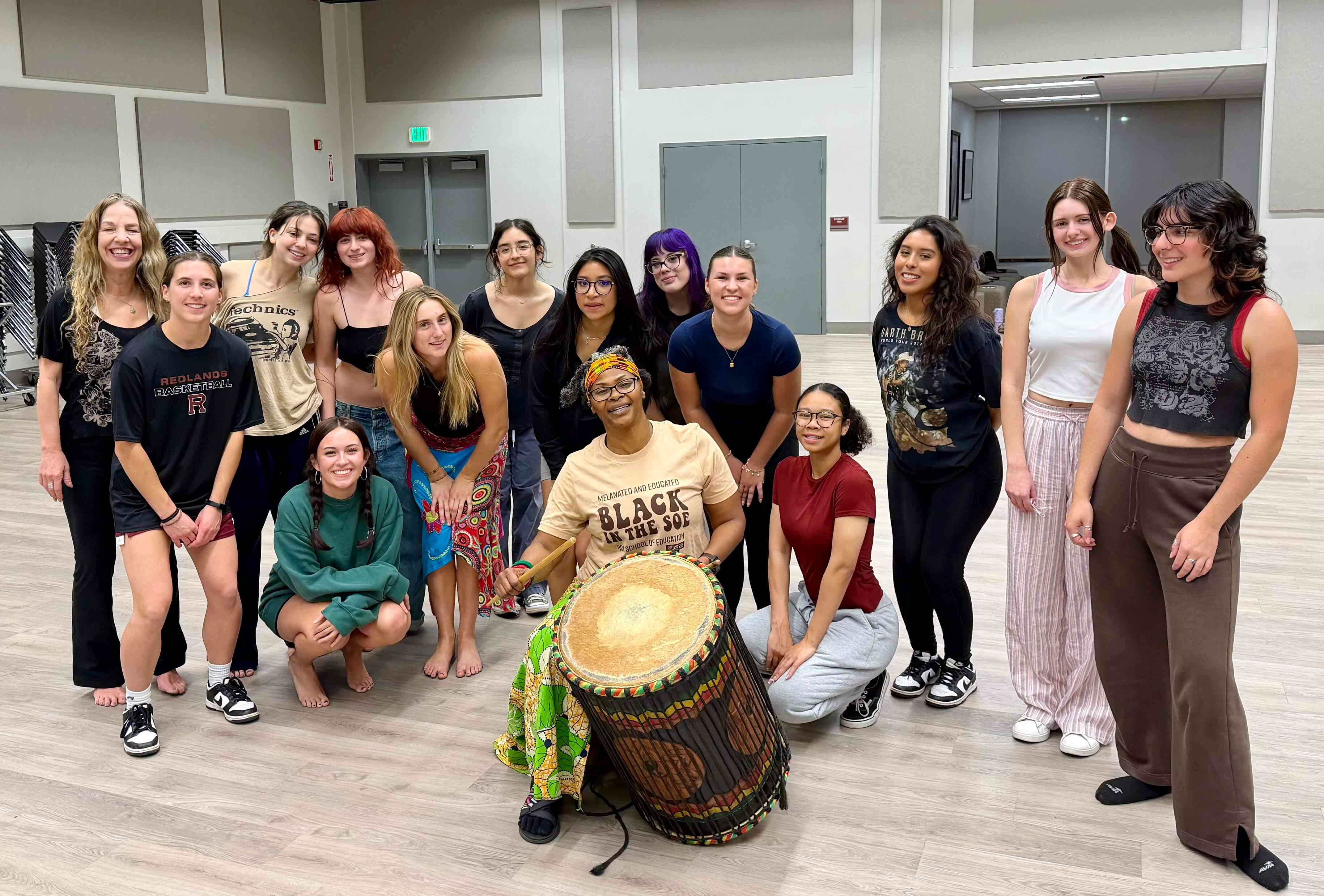 a group of women posing for a photo